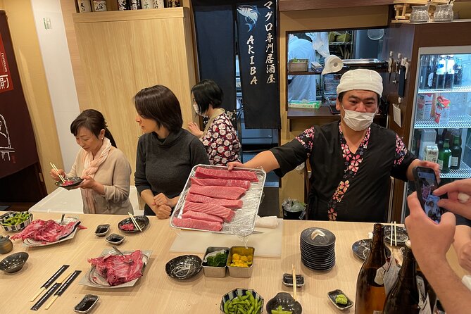 Tuna Cutting Show in Tokyo & Unlimited Sushi & Sake - Savor Unlimited Sushi and Sake