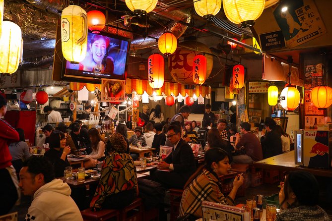 Shibuya Night Bar Hopping Walking Tour in Tokyo - Enjoying Local Food and Drinks