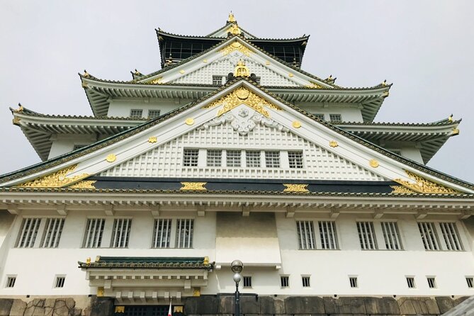 Full Day Walking Tour in Osaka Castle Temples and Ukiyoe - Osaka Castle History and Significance