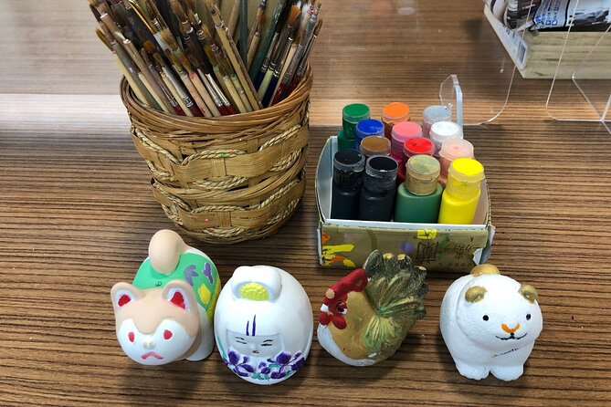 Fukuoka Open Top Bus and Hakata Doll Painting Experience With Guide - Getting Ready for the Tour